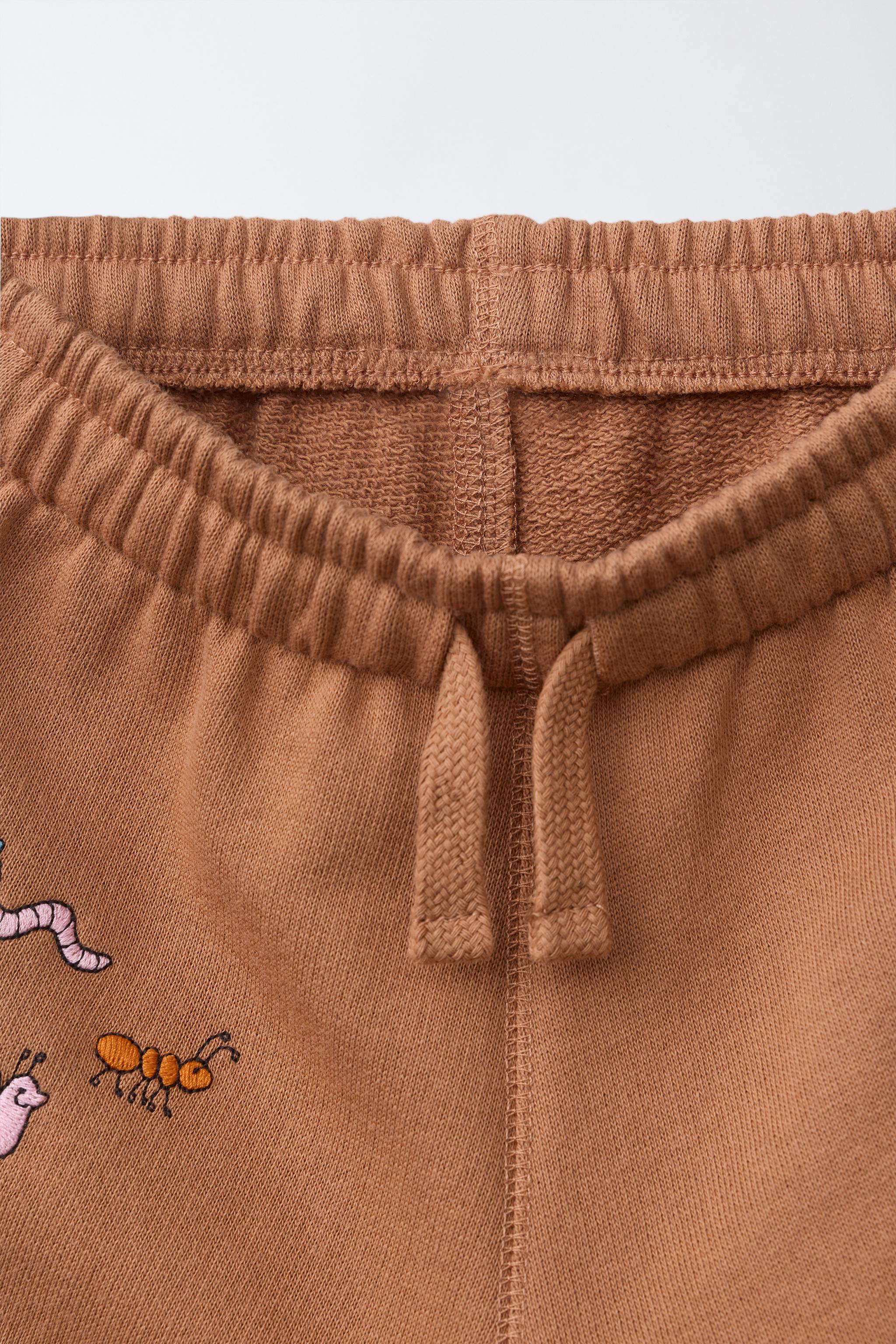 EMBROIDERED ANIMAL PLUSH PANTS